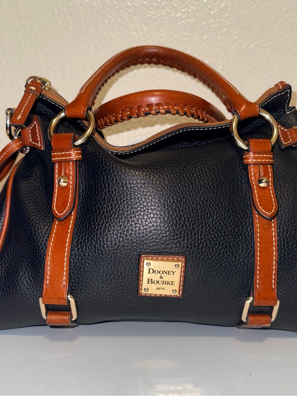 Dooney & Bourke Black with Brown Trim Pebbled Leather Satchel